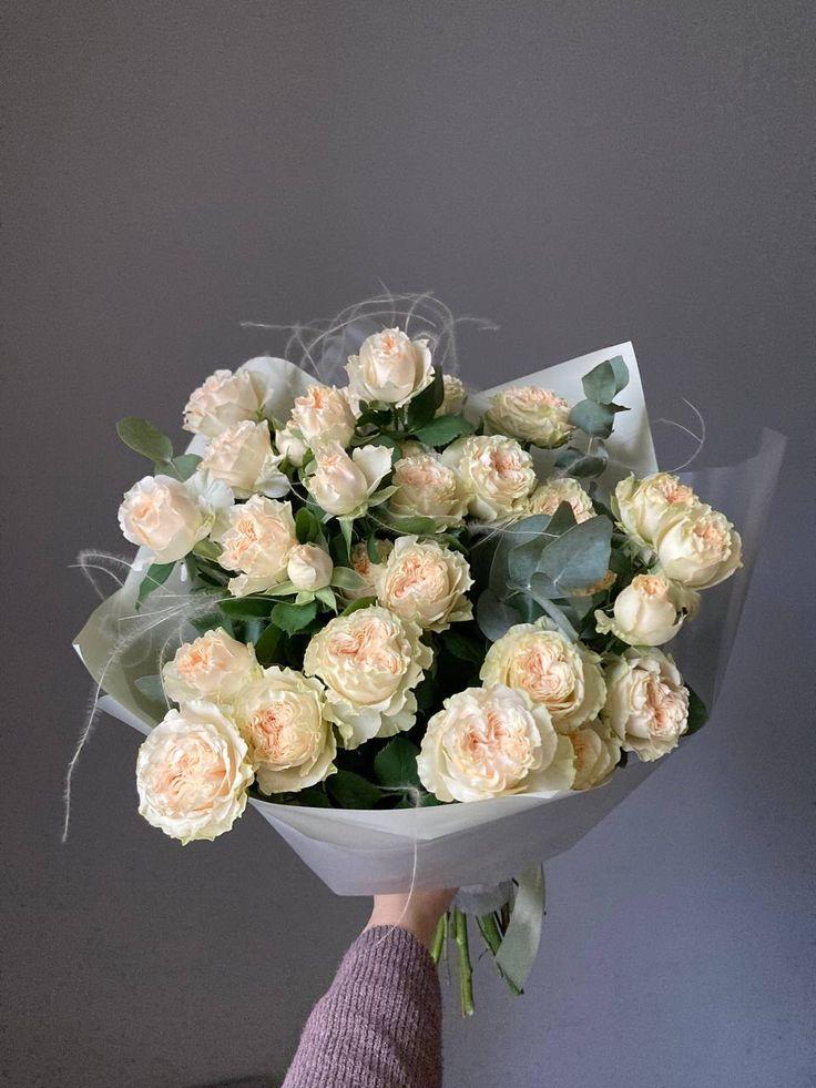 LedgerPilotTerminal workshop space where corporate flower arrangements are designed and prepared for business delivery